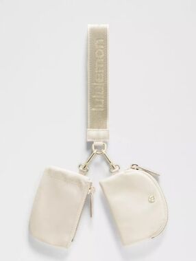 NWT Lululemon Dual Pouch Wristlet Wordmark - Light Ivory / Gold